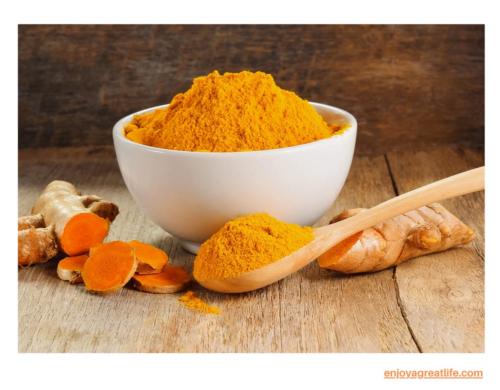 turmeric spice in bowl with spoon