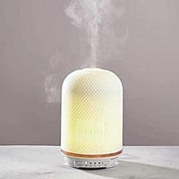 neom wellbeing pod diffusing essential oil