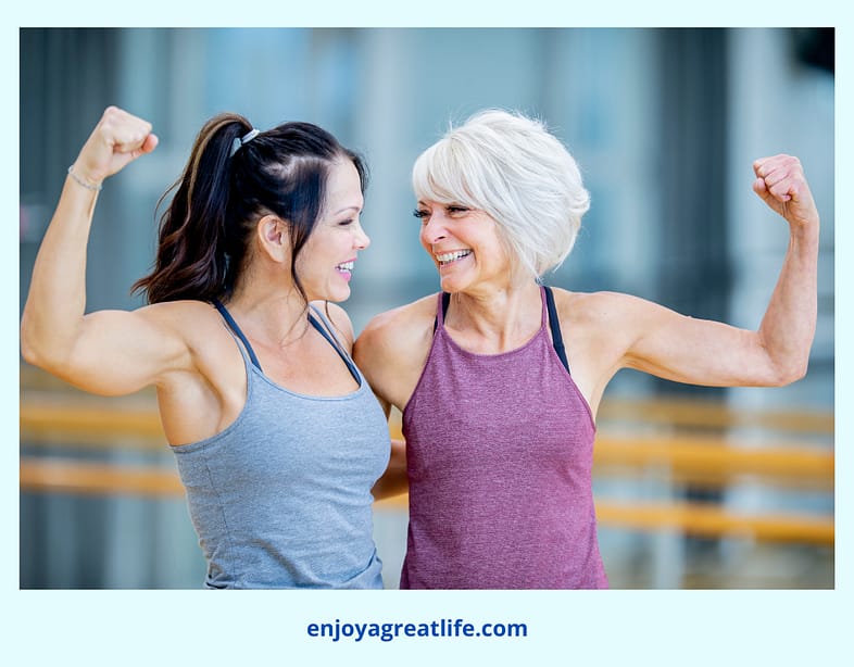 strong women flexing their arm muscles