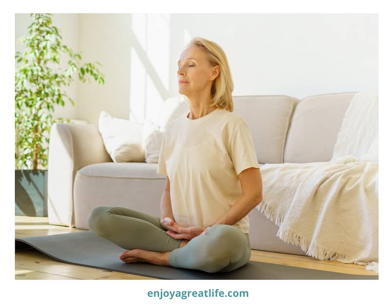 woman sitting practicing deep breathing