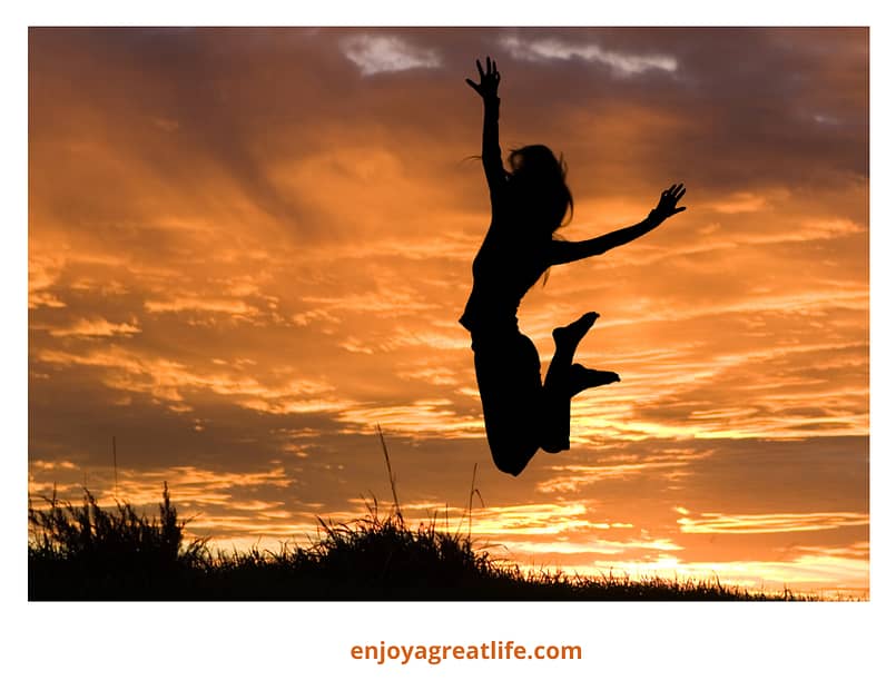 girl jumping for joy exhilerated