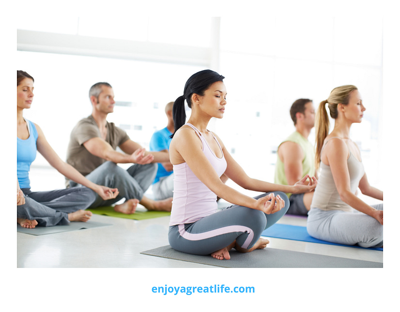 group of people meditating