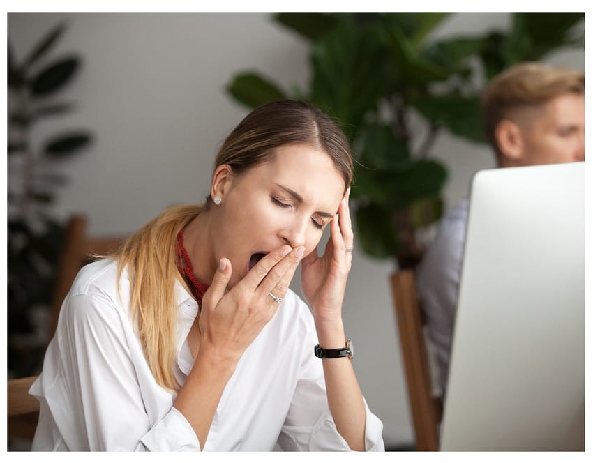 lack of sleep tired lady at work