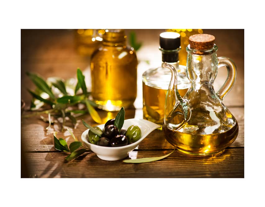 rustic picture of extra virgin olive oil and olives