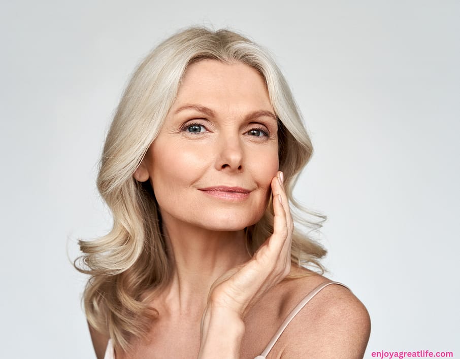 mature woman platinum hair and glowing skin
